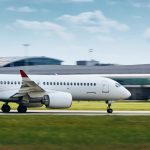 Traffic on airport runway. Airplane on the move during take off.